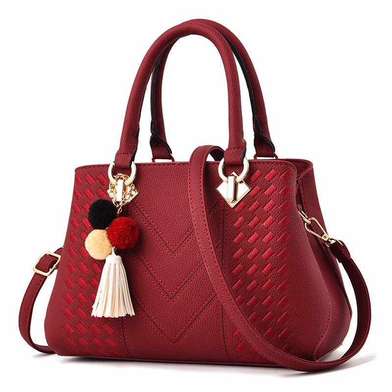 Bolso de mujer rojo vino