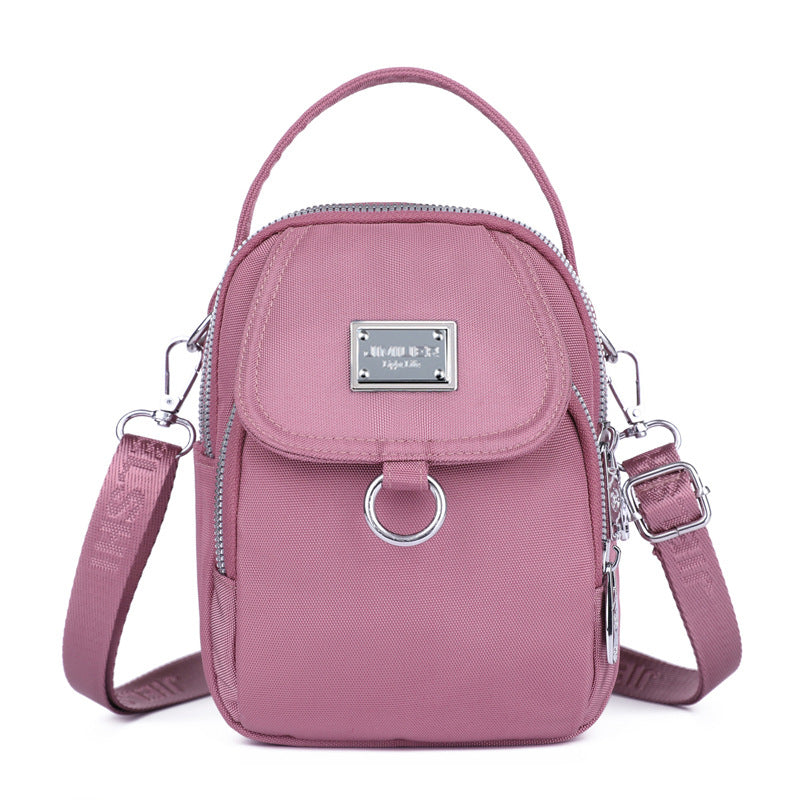 Bandolera de nylon rosa